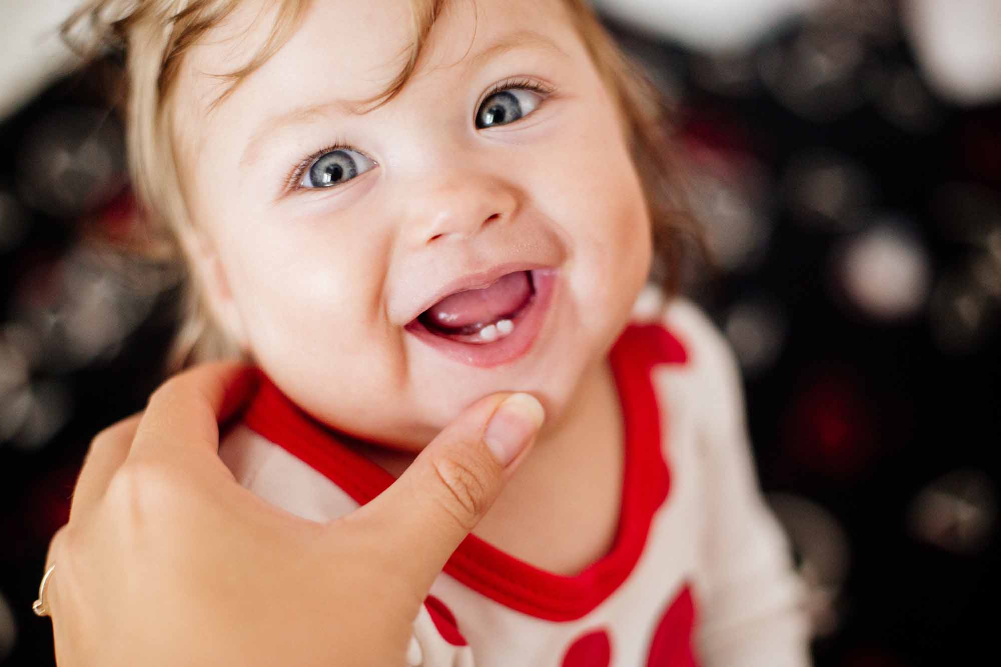 Baby with first teeth erupting - Smart Pediatric Dentistry, Utah
