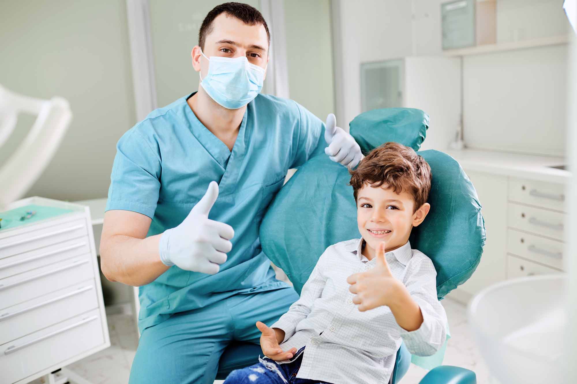 Boy with pediatric dentist - Smart Pediatric Dentistry, Utah