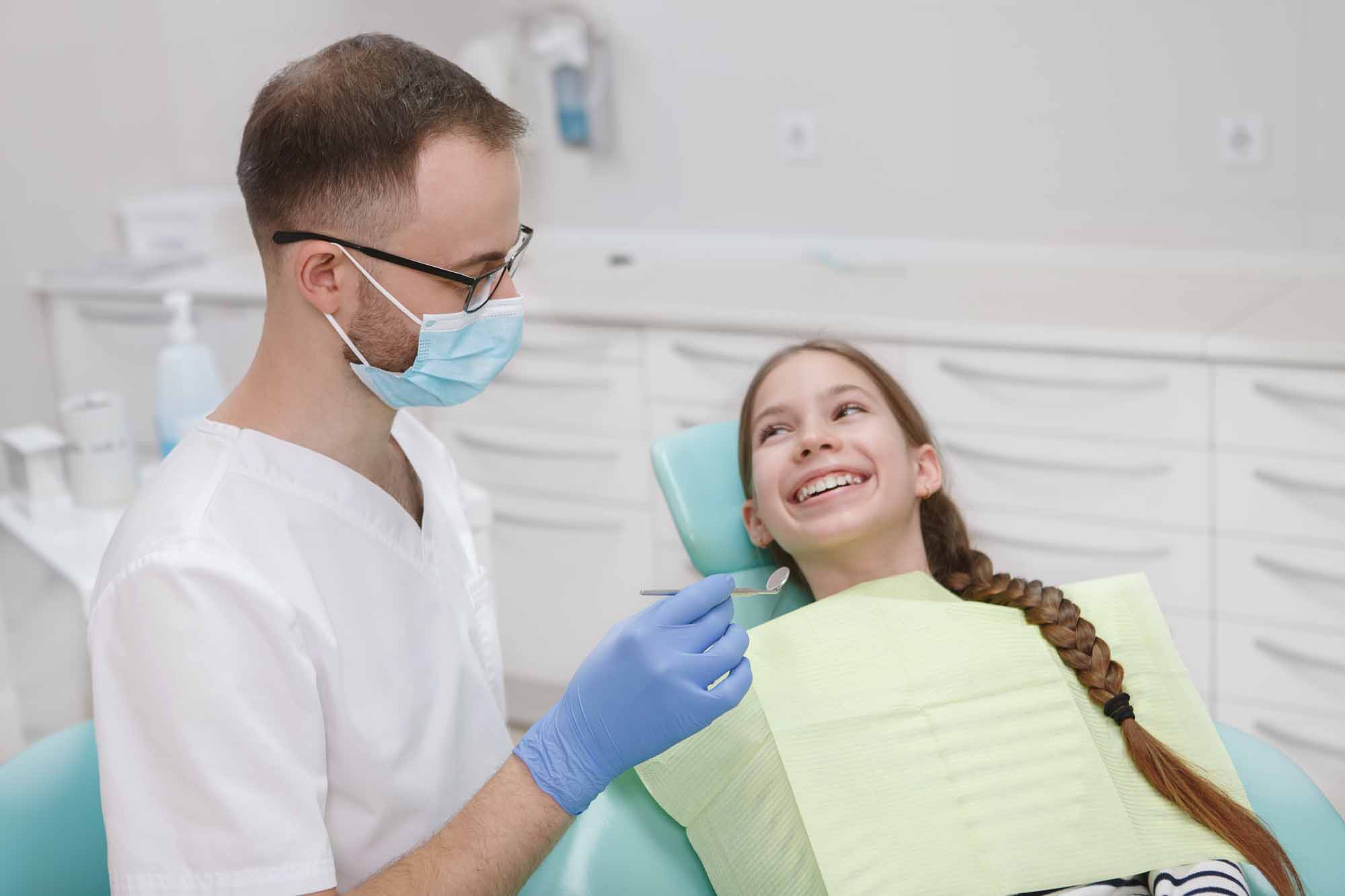 Girl smiling at her dentist - Smart Pediatric Dentistry, Utah
