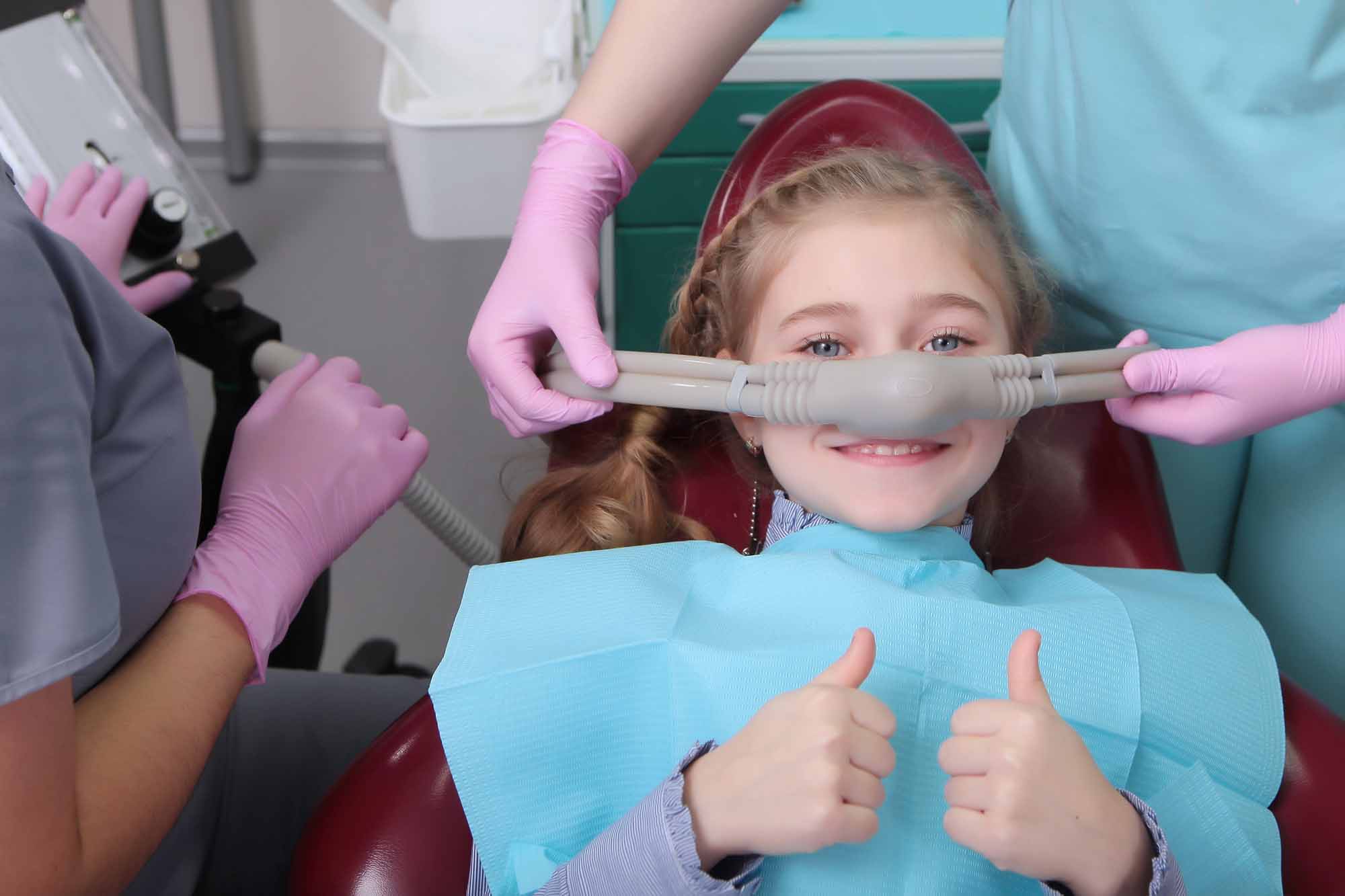 Young girl comfortable with superficial sedation - Smart Pediatric Dentistry, Utah